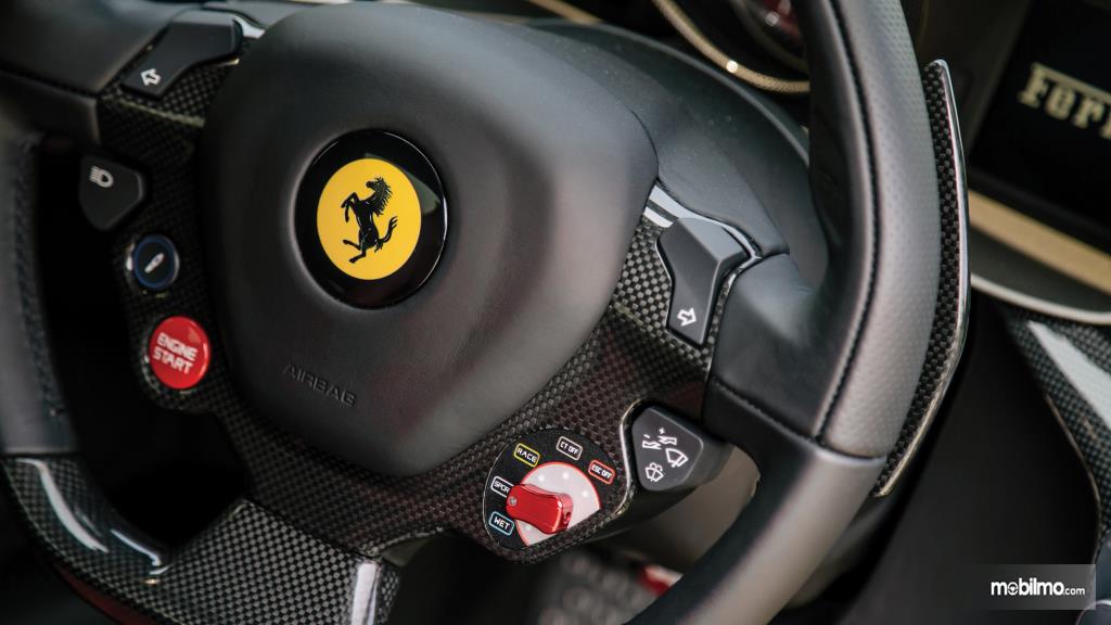 Fitur Ferrari F12berlinetta 2012 hadirkan lima pilihan mode berkendara dari WET hingga ESC-OFF