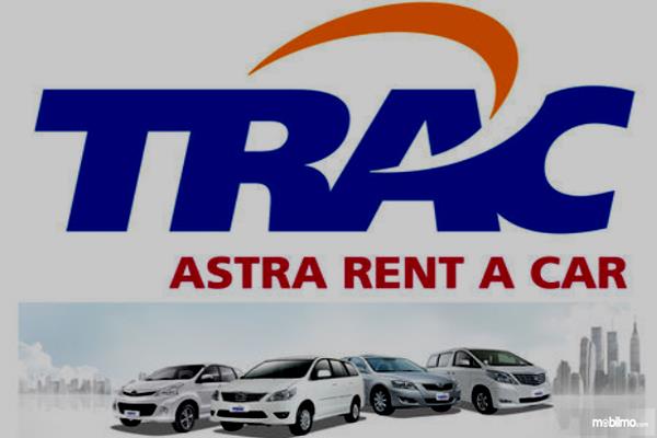 Gambar ini menunjukkan logo TRAC dan beberapa kendaraan di bawahnya