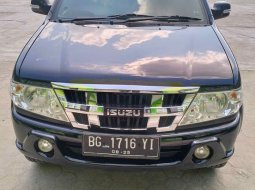 2010 Isuzu Panther GRAND TOURING Hitam - Jual mobil bekas di Sumatra Selatan