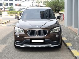 2014 BMW X1 sDrive18i xLine Coklat - Jual mobil bekas di DKI Jakarta