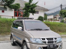 2009 Isuzu Panther GRAND TOURING Coklat - Jual mobil bekas di Jawa Tengah