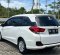 2016 Honda Mobilio E MT Hitam - Jual mobil bekas di Sumatra Barat-1